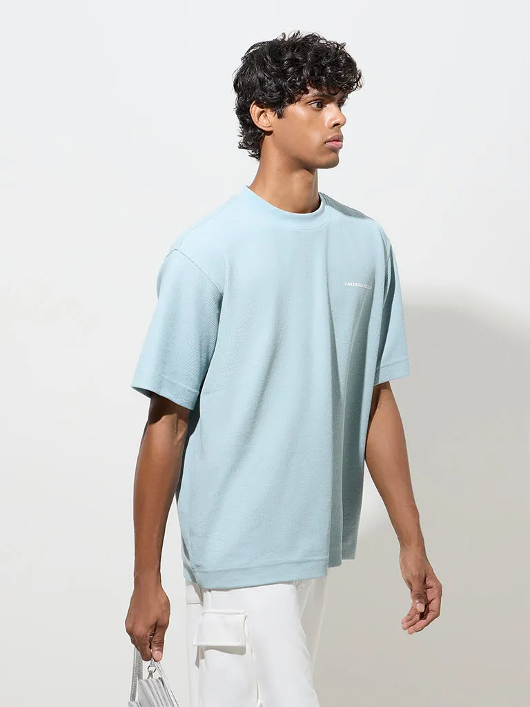 Studiofit Light Blue Text Printed Relaxed-Fit T-Shirt