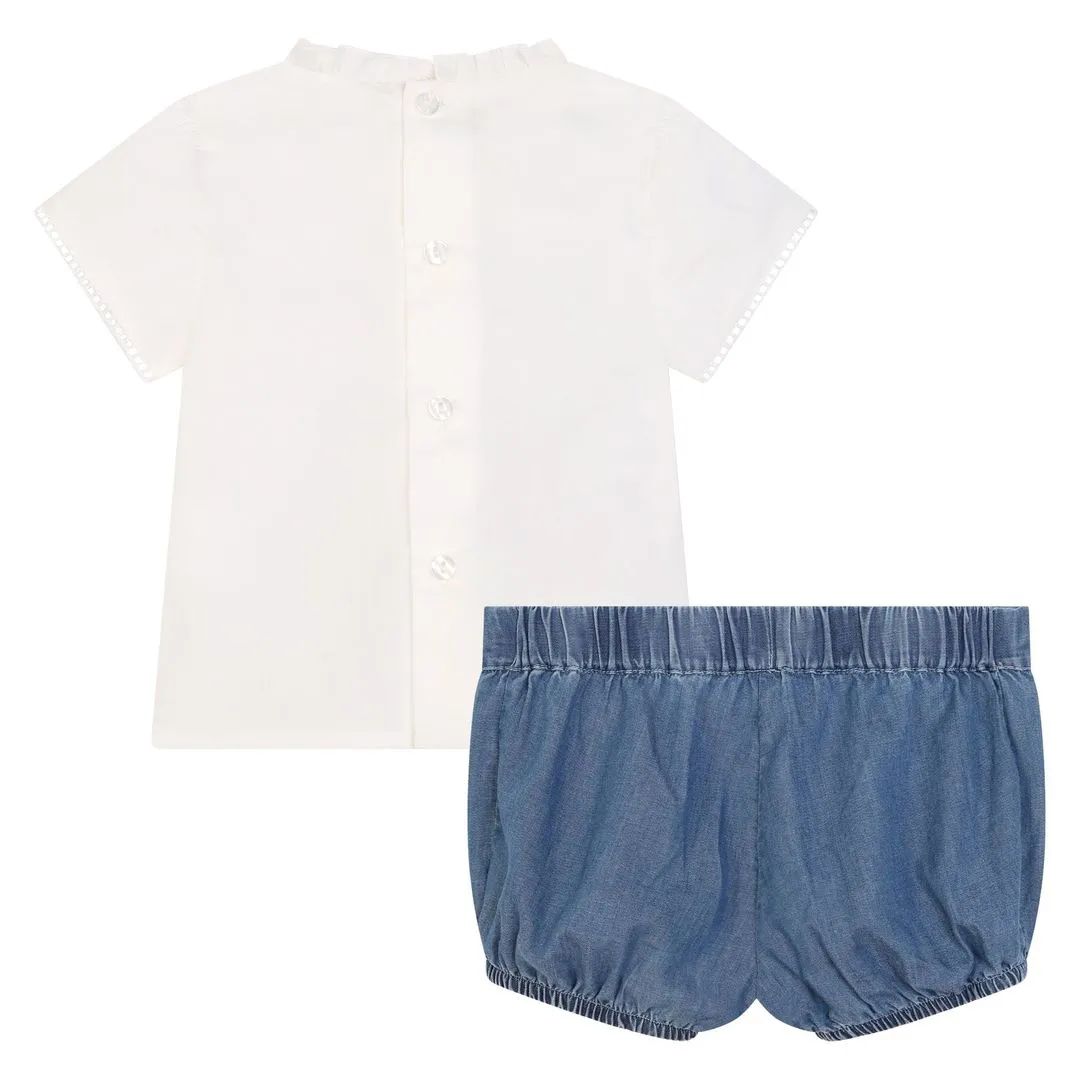 White Ruffle Blouse and Blue Shorts